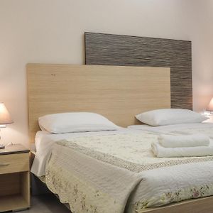 Delfini Beach Hotel & Suites
